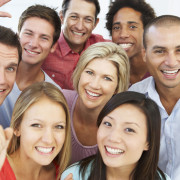 8 People in a group, smiling at the camera