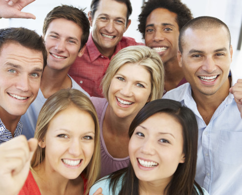 8 People in a group, smiling at the camera